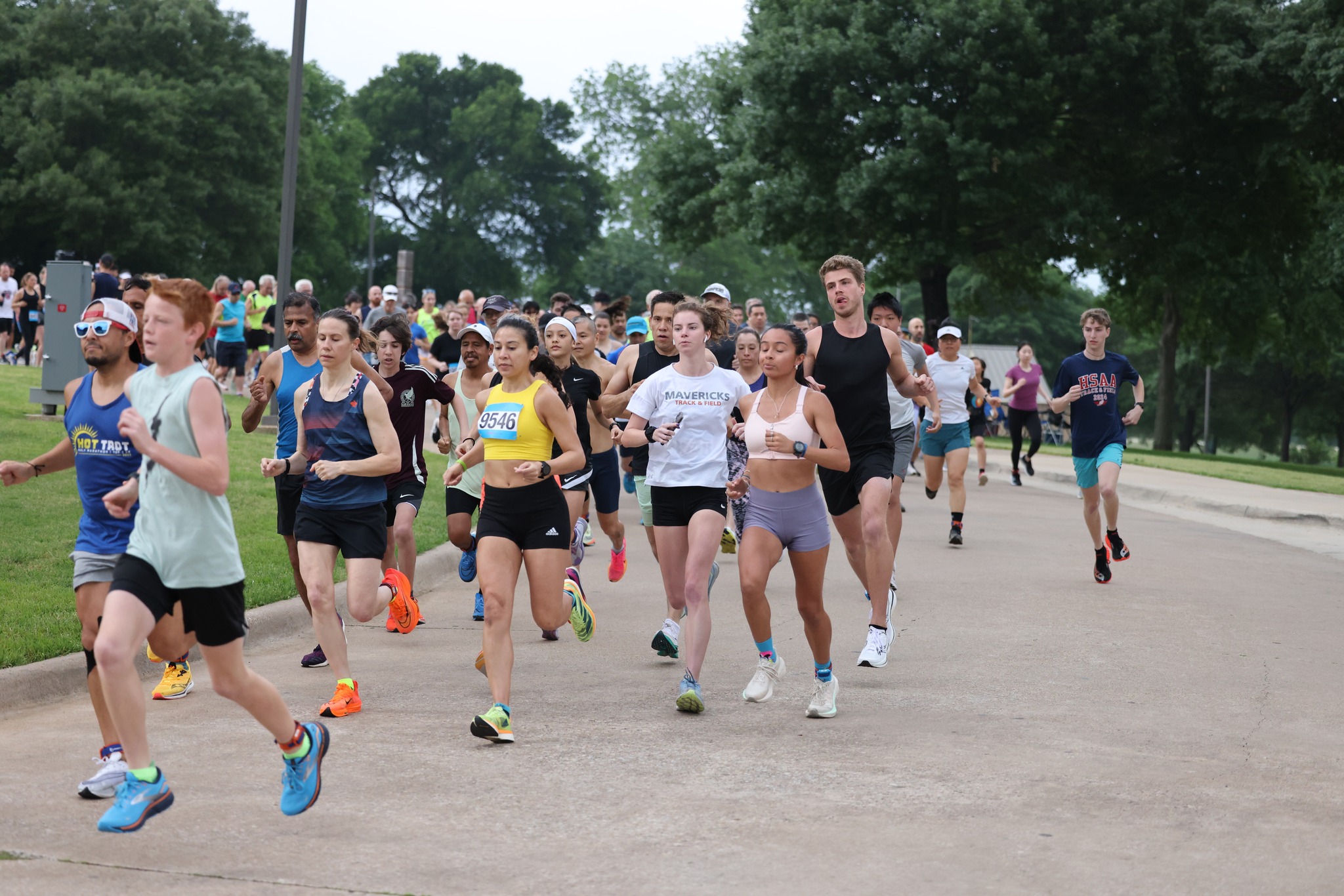 Runners beginning a race in a park